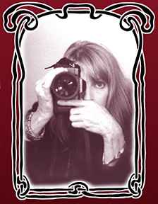 Photo of Linda McCartney with a camera